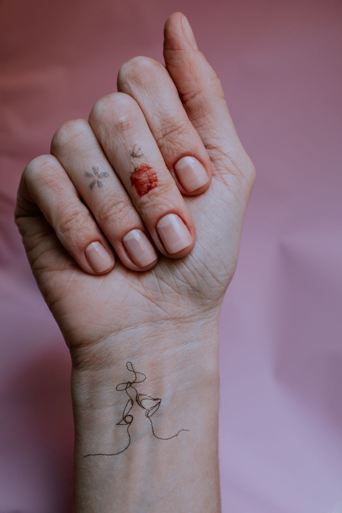 French tip jelly pink chrome nails with modern metallic smile line