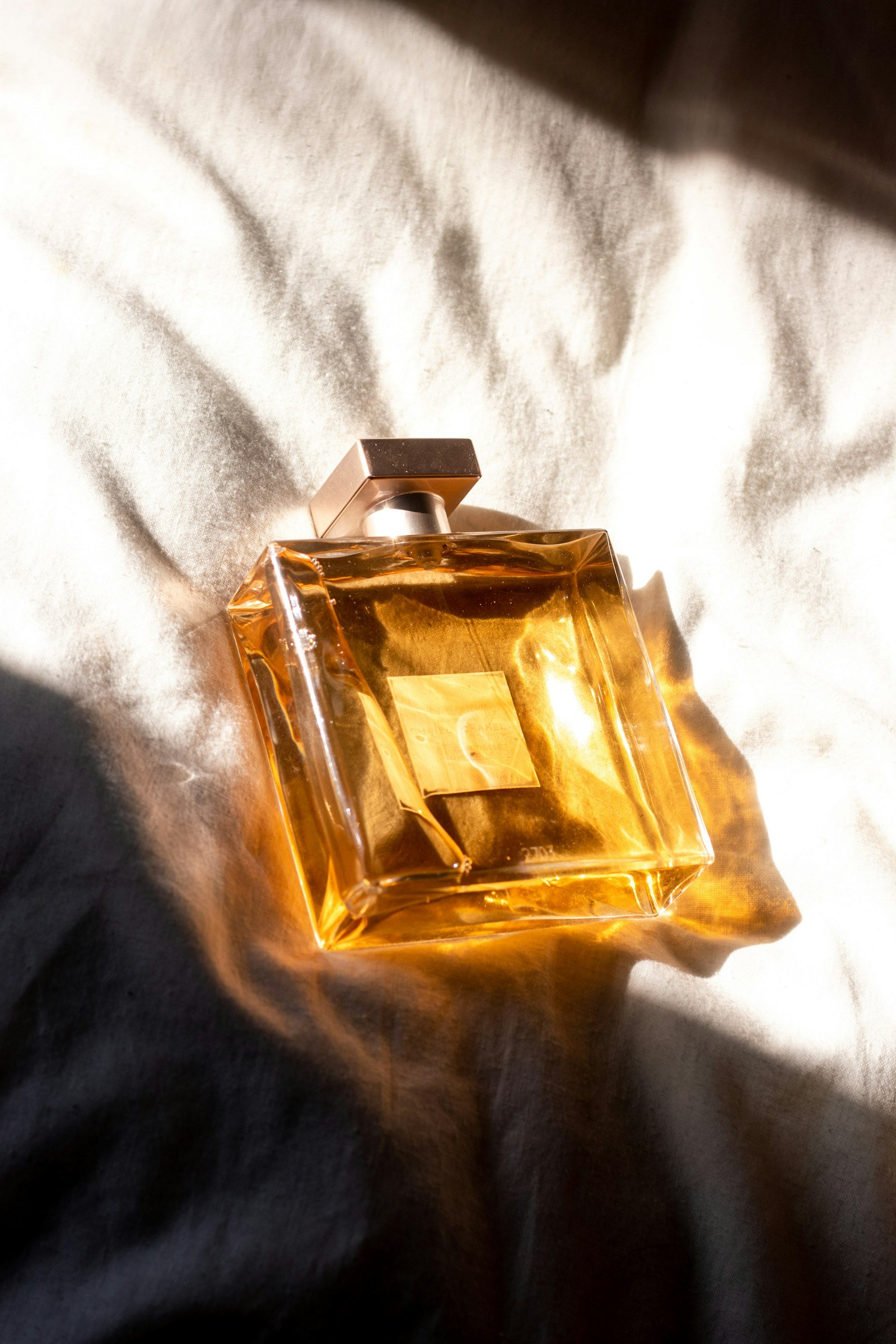 Luxury perfume bottle styled for the solid perfume aesthetic trend