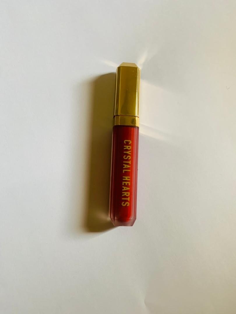 Applying berry lip liner to define lips in vampy berry lips tutorial