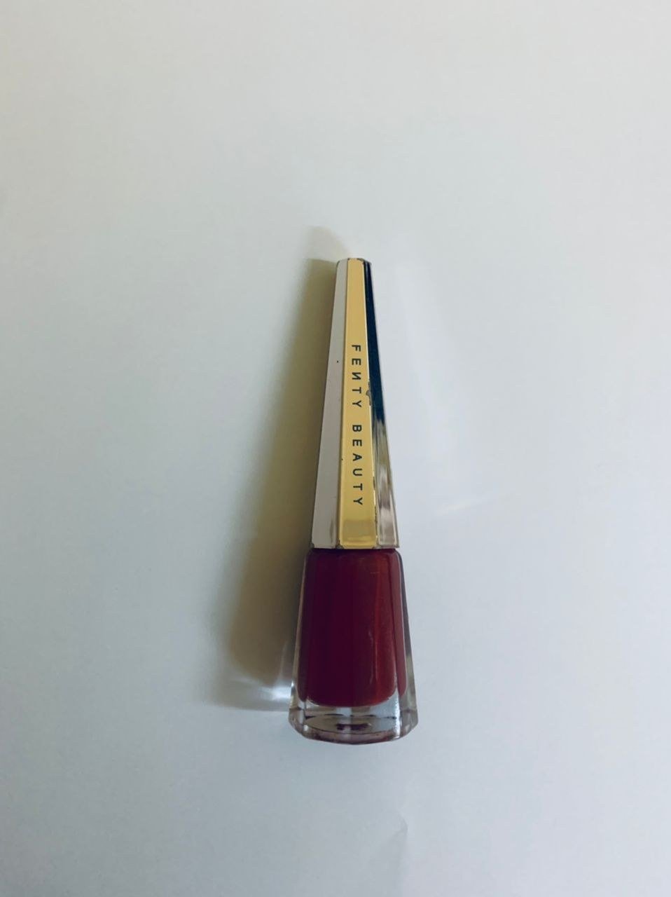 Perfecting crisp lip edges with concealer in vampy berry lips tutorial
