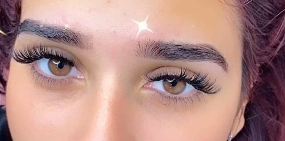 Glamorous evening wispy lashes with soft smoky bronze eyeshadow