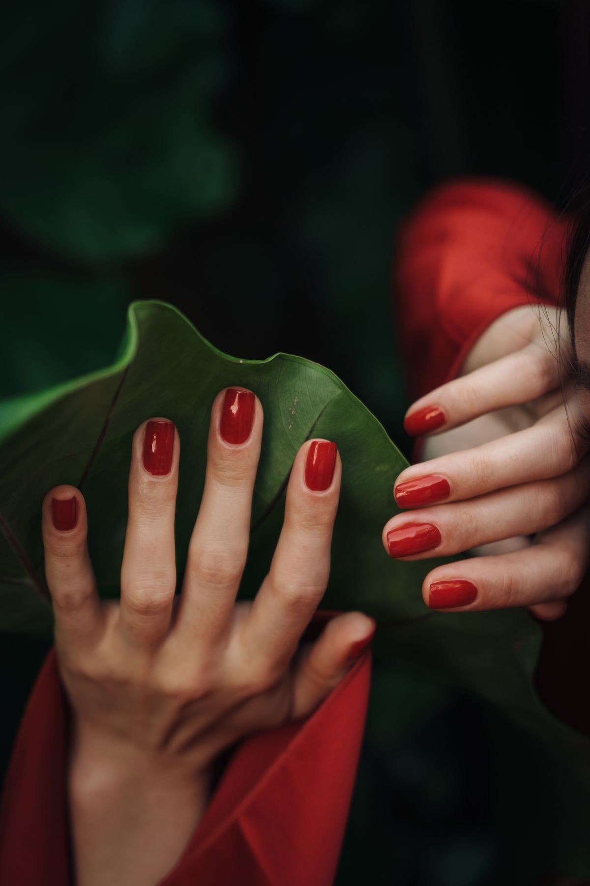 Dark red cat eye French tip nails with glowing smile line