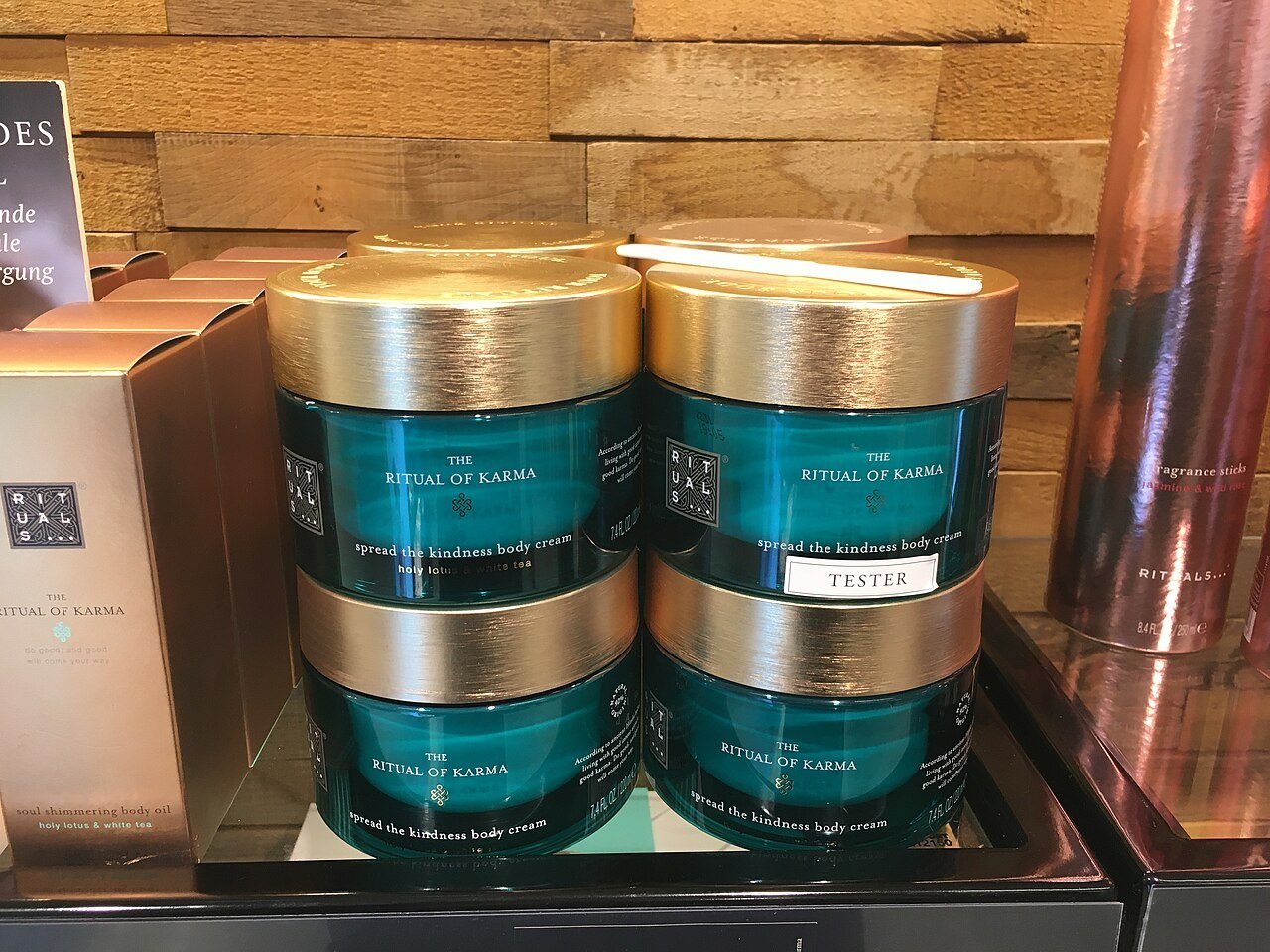 Eight jars of body cream from company Rituals on sale shelf in German shop