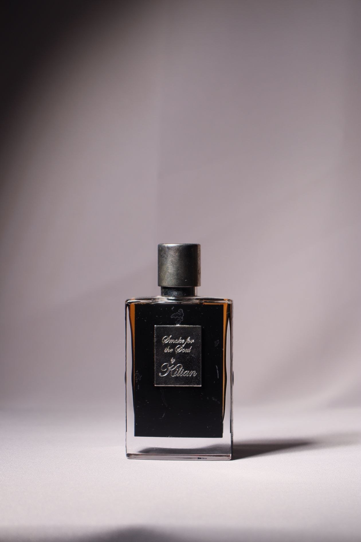 Stylish perfume bottle captured with elegance, showcasing luxury and fragrance appeal