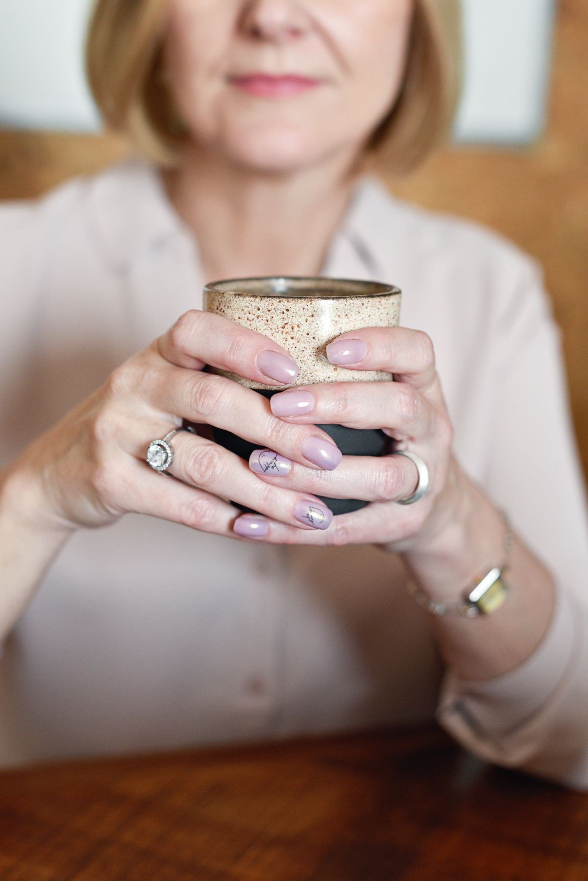Abstract caramel swirl nail art with latte inspired design