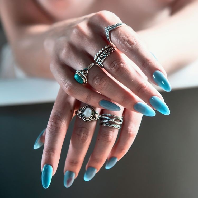 Teal Cat Eye And Chrome Manicure example for Cat eye and chrome nails ideas