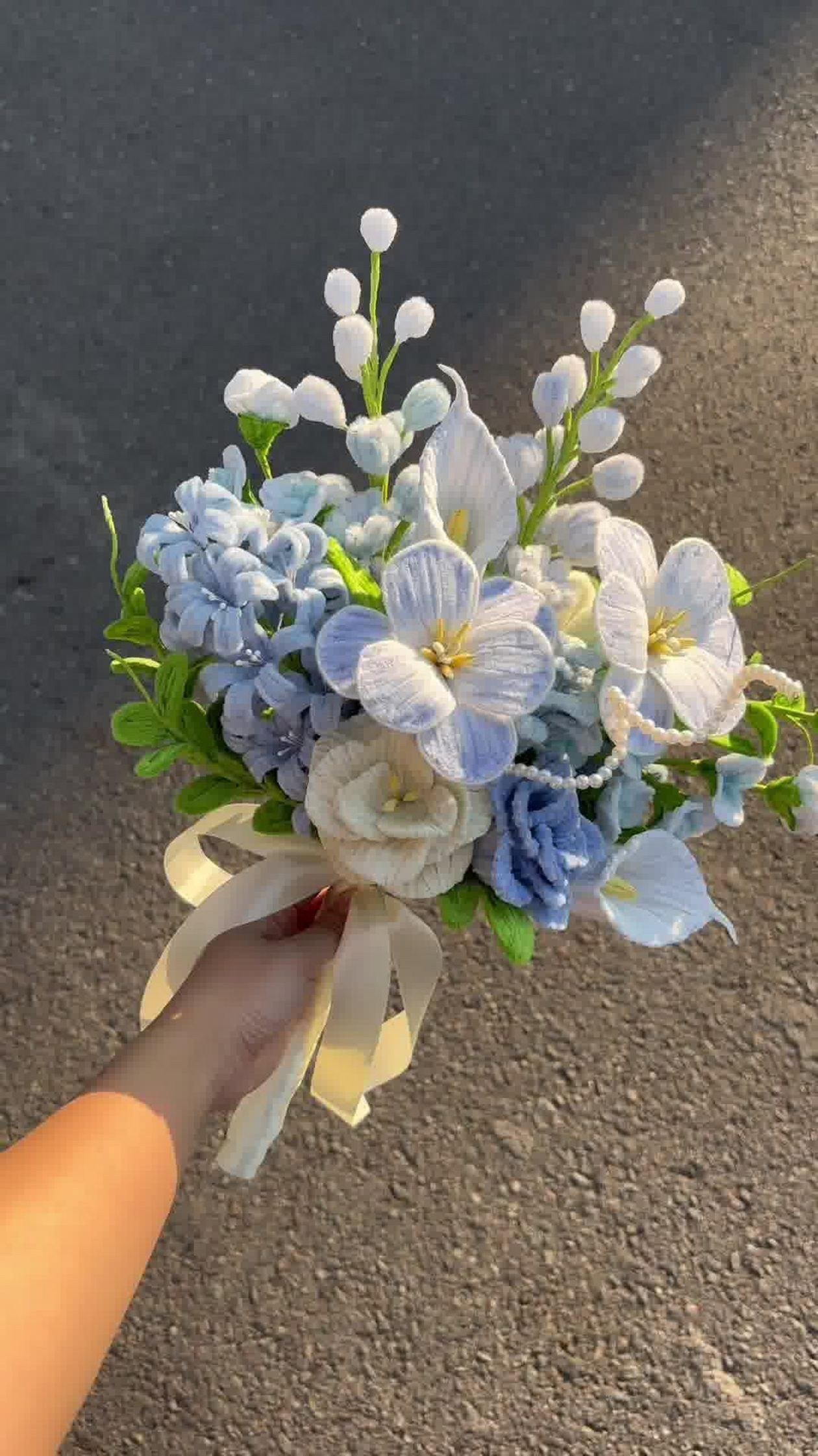 Elegant bouquet with blue and white flowers