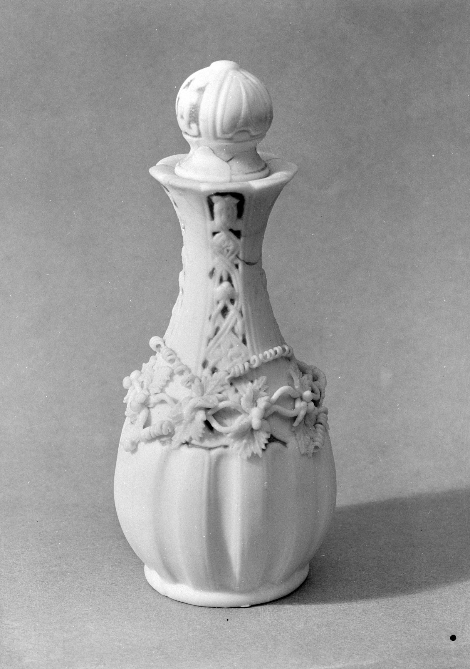Happy couple holding their custom blended wedding perfume bottles