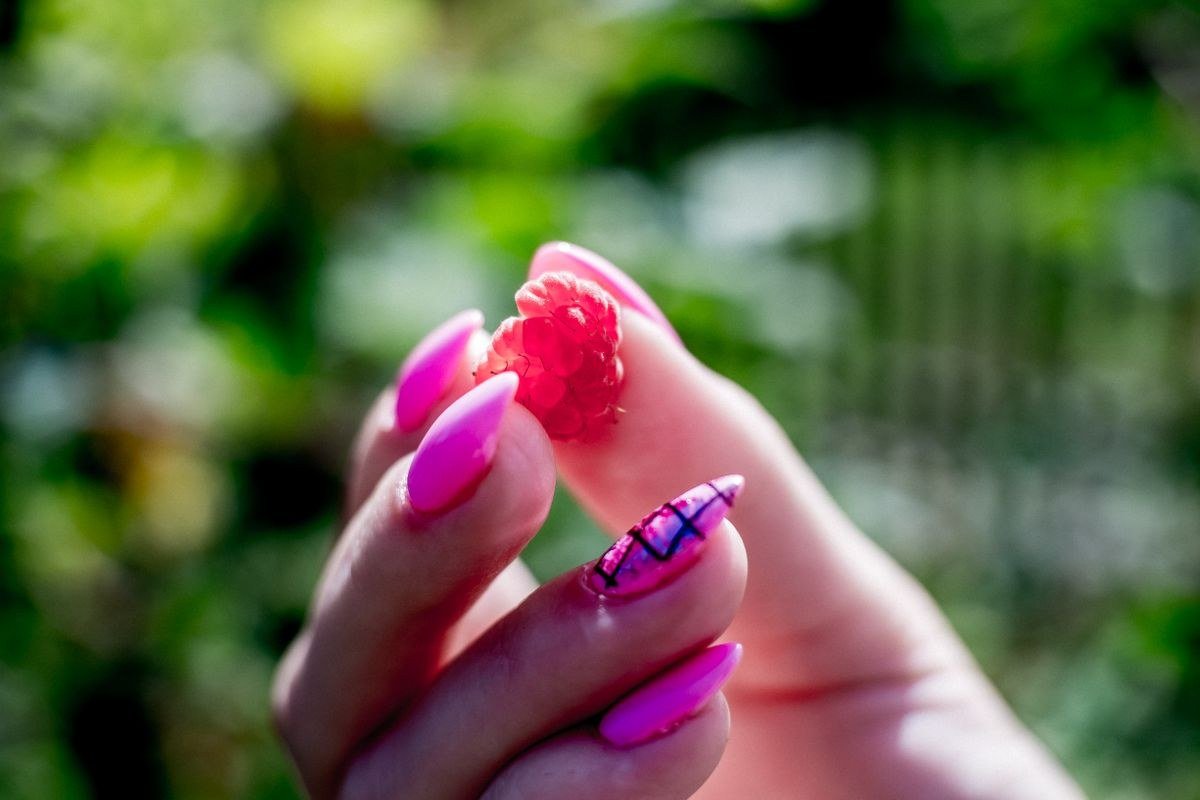 Raspberry jelly nails with juicy translucent pink-red glass finish