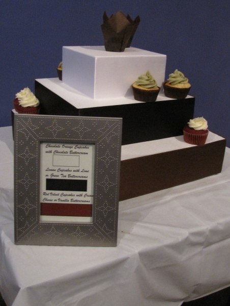 Lavender decorated wedding cake in lavender luxe wedding ideas display