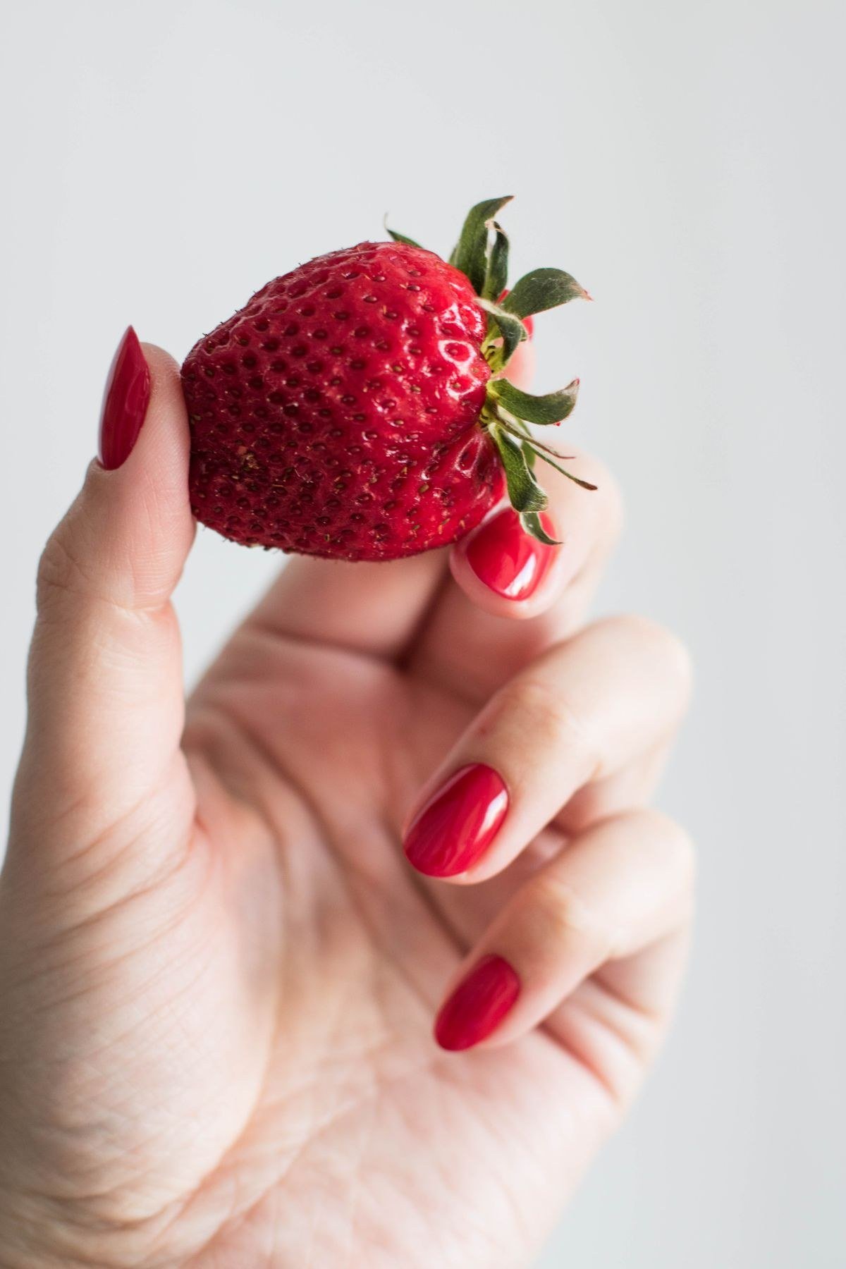 Raspberry jelly French tip nails with translucent smile line