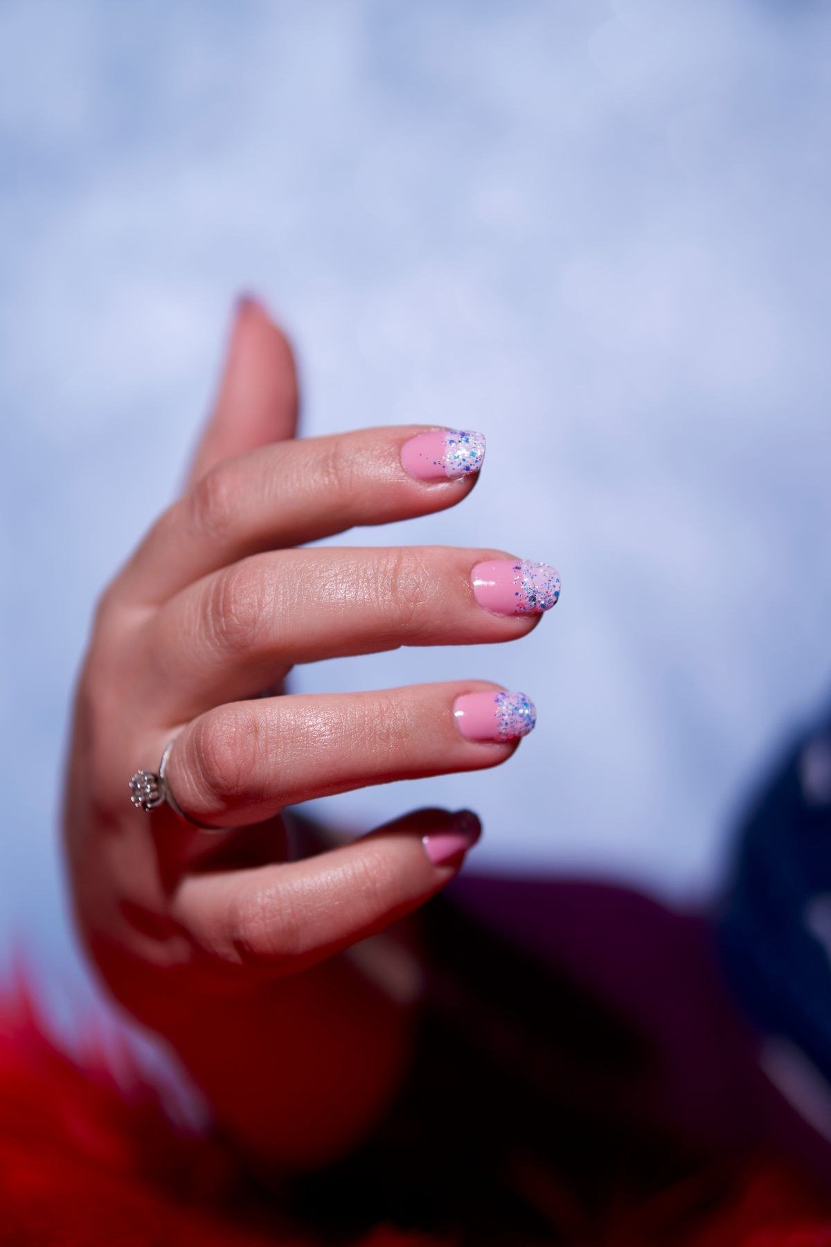 Raspberry jelly chrome nails with molten reflective shine