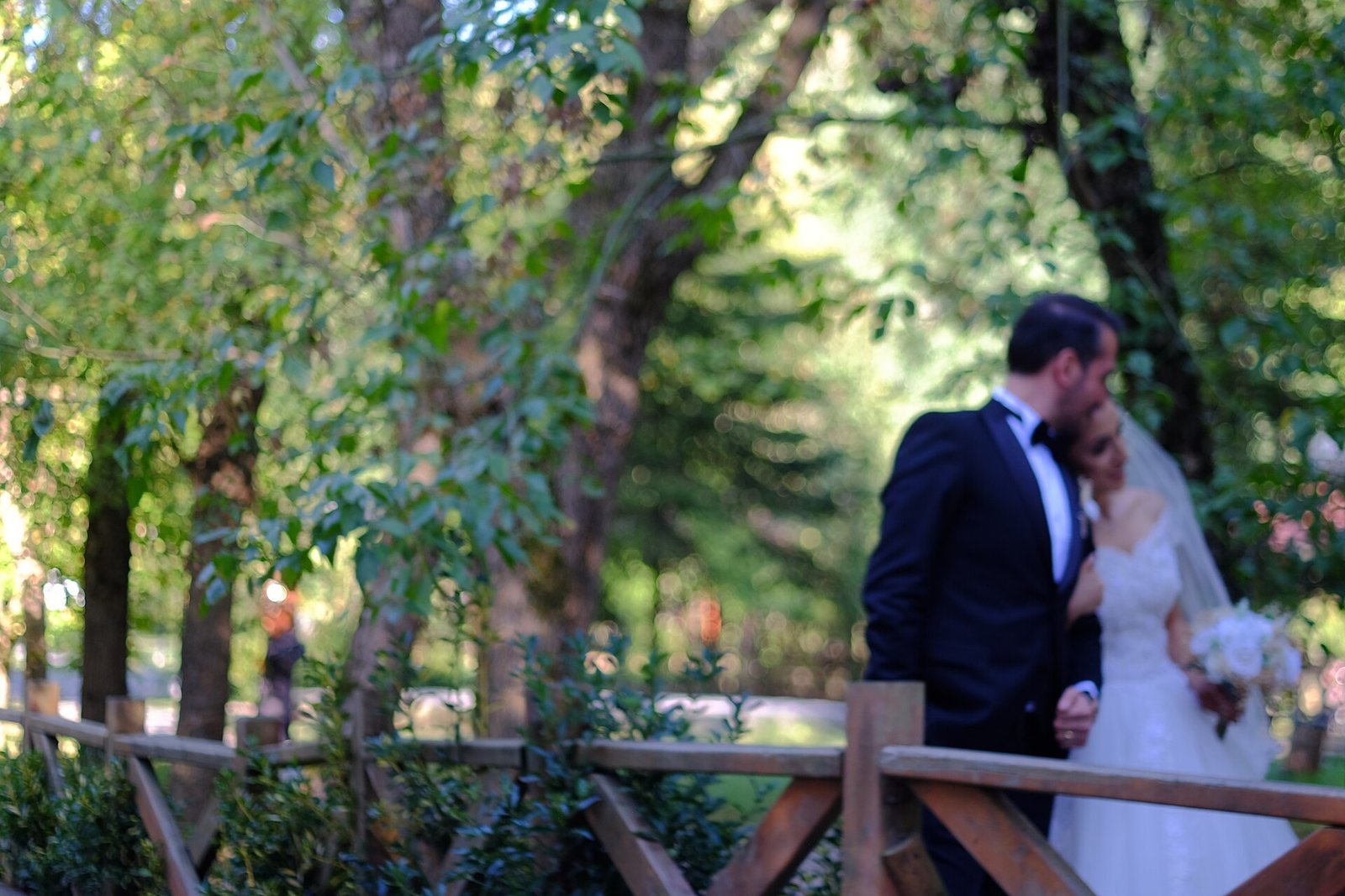 Tall moss topiary spheres as dramatic wedding table centerpieces