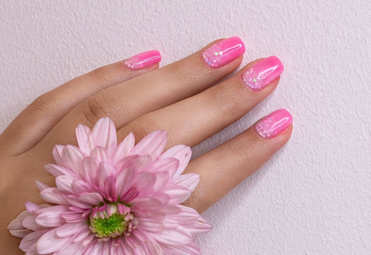 Raspberry jelly nails with luxurious gold foil accents