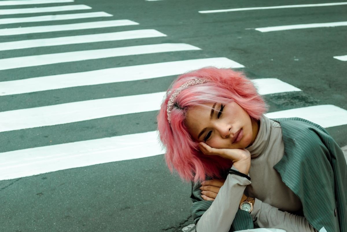 Dusty rose pink hair in soft romantic waves