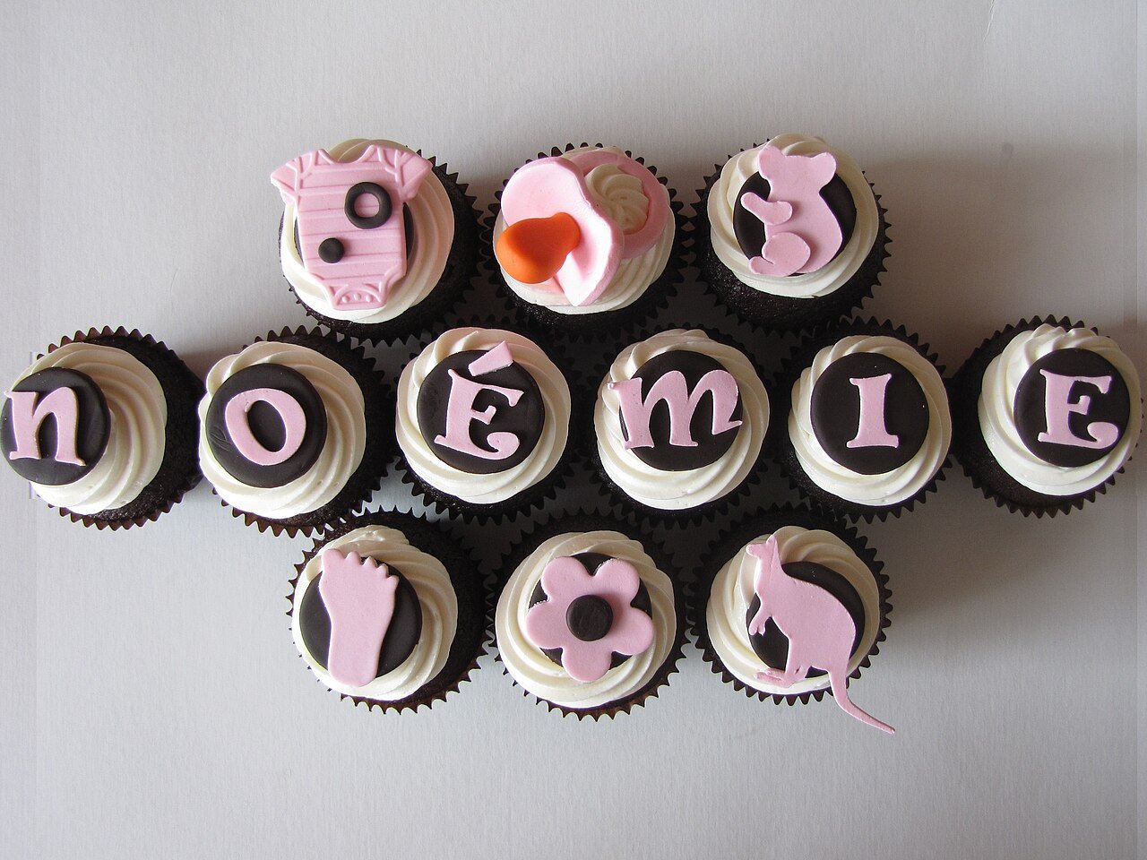 Cupcakes decorated with pink skull designs