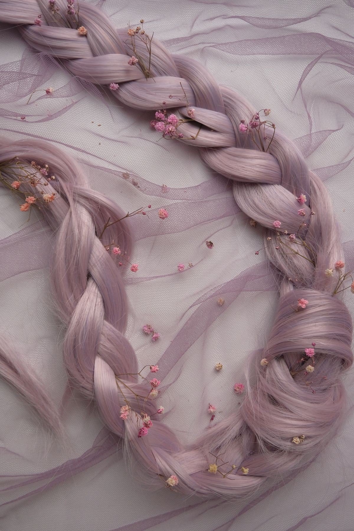 Dusty rose pink bob haircut with sleek shape