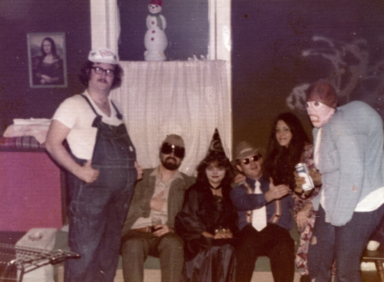 People in vintage Halloween costumes