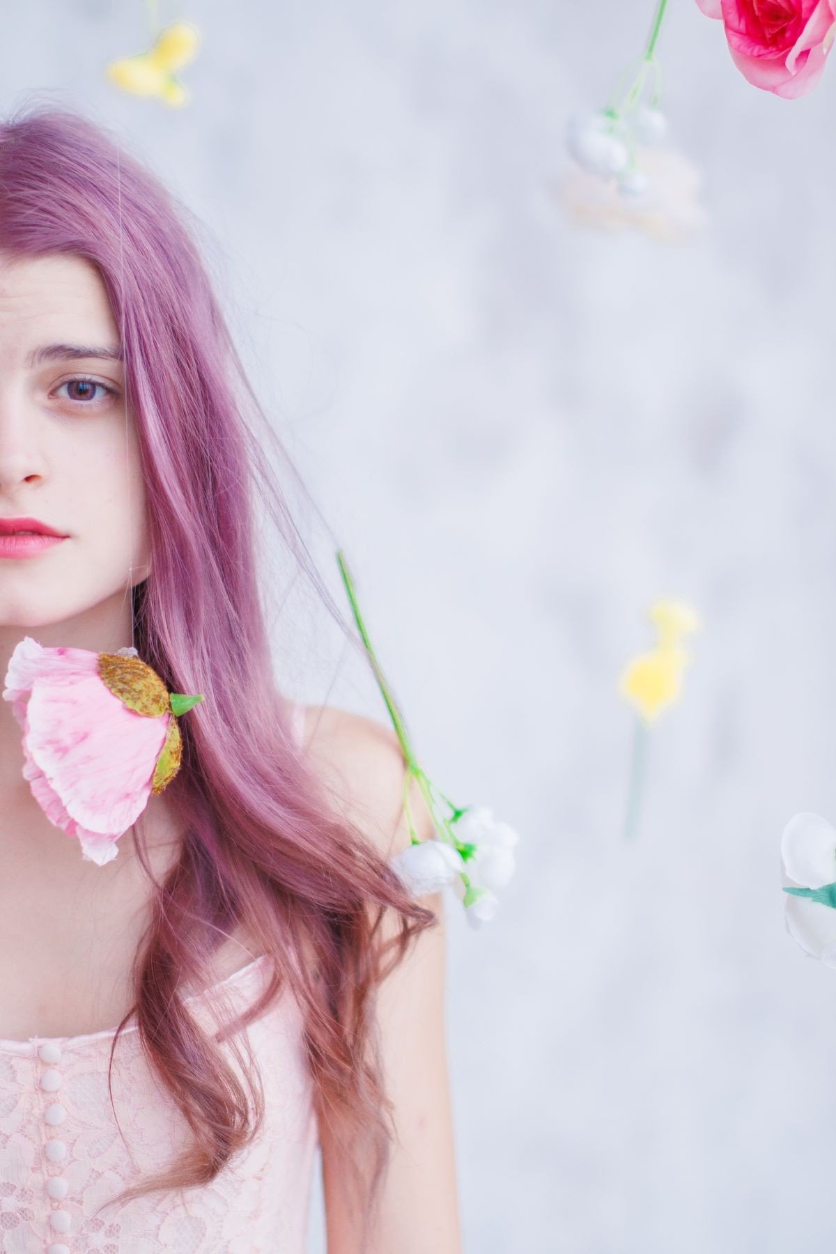 Dusty rose ombre from brown roots to pink ends