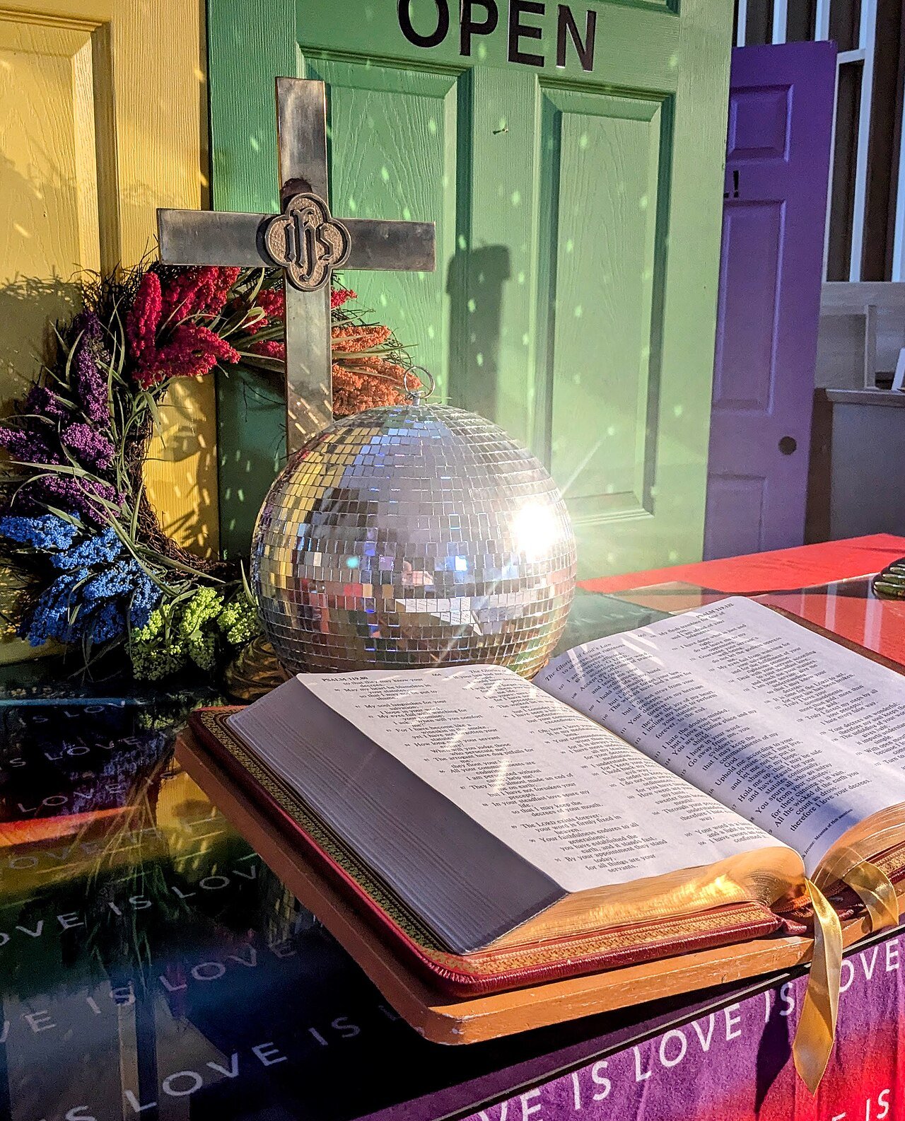 Disco ball hanging over a party table
