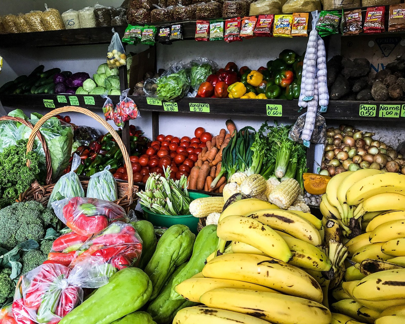 Florist creating vegetable centerpiece wedding ideas with fresh produce
