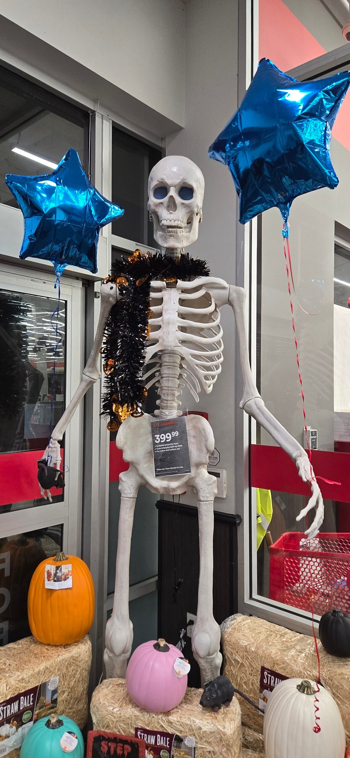 Skeleton decoration with blue star balloons
