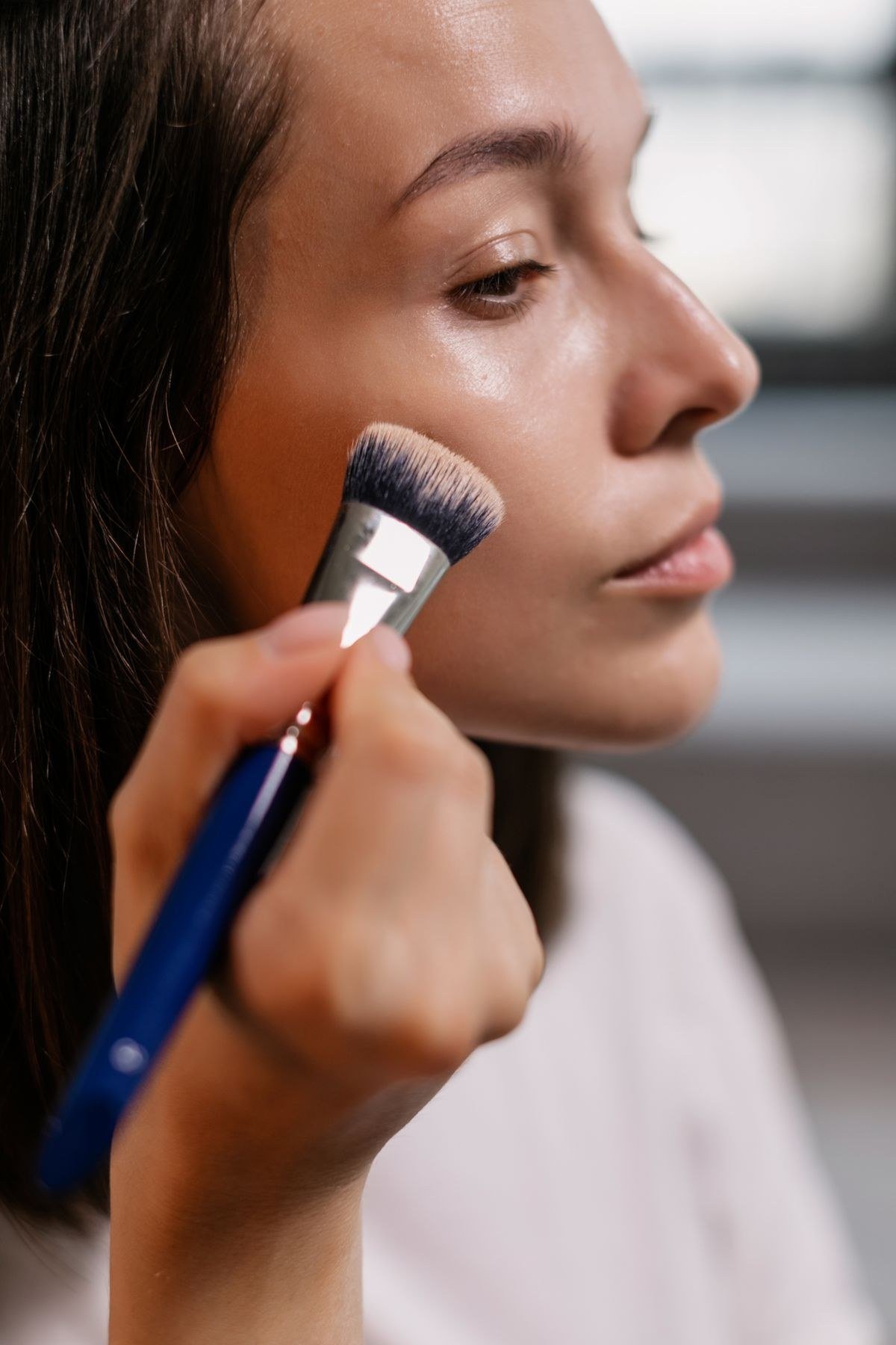Close-up of cloud skin makeup with soft blurred velvety finish