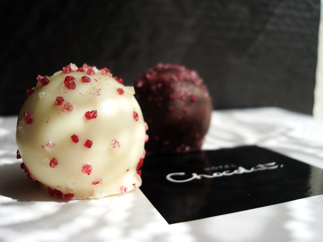 White chocolate truffle with red sprinkles