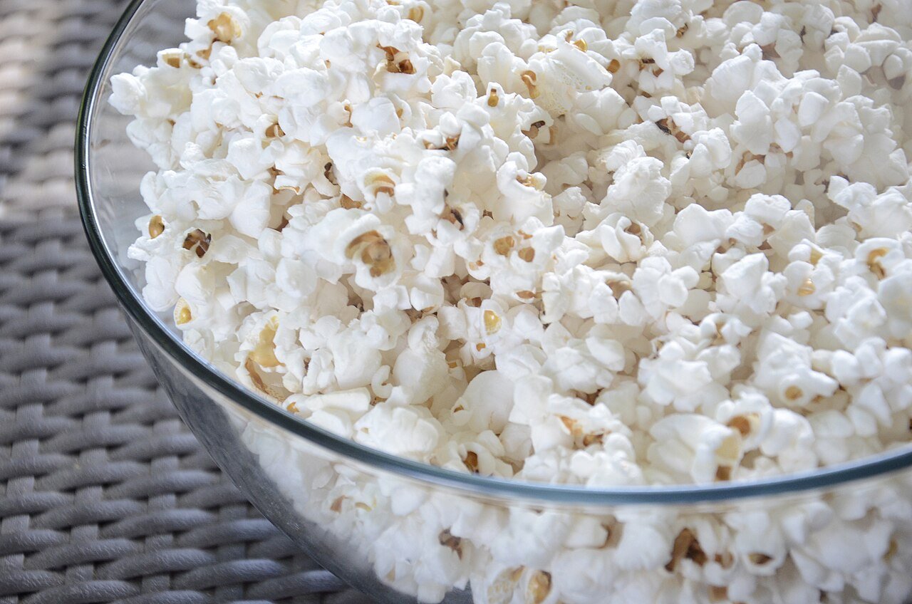 Glass bowl of popcorn