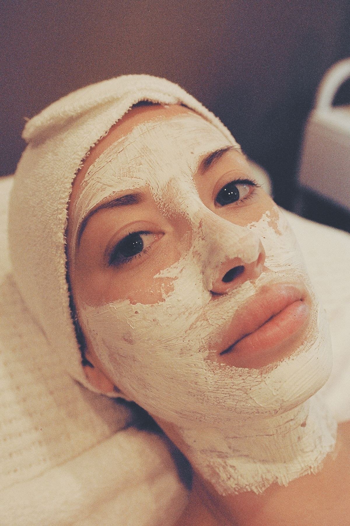 Avocado and honey face mask mixture in bowl