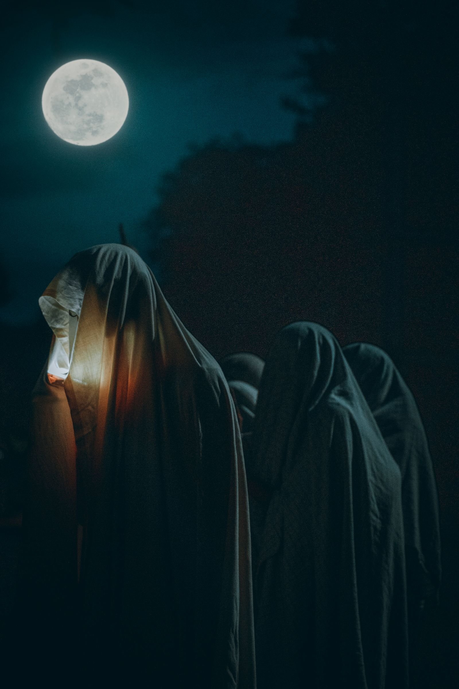 Horror night clown figure lurking at a creepy carnival party