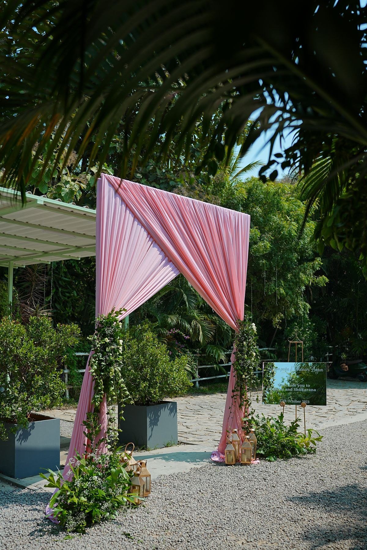 Botanical stained glass wedding arch with floral motifs and leaves