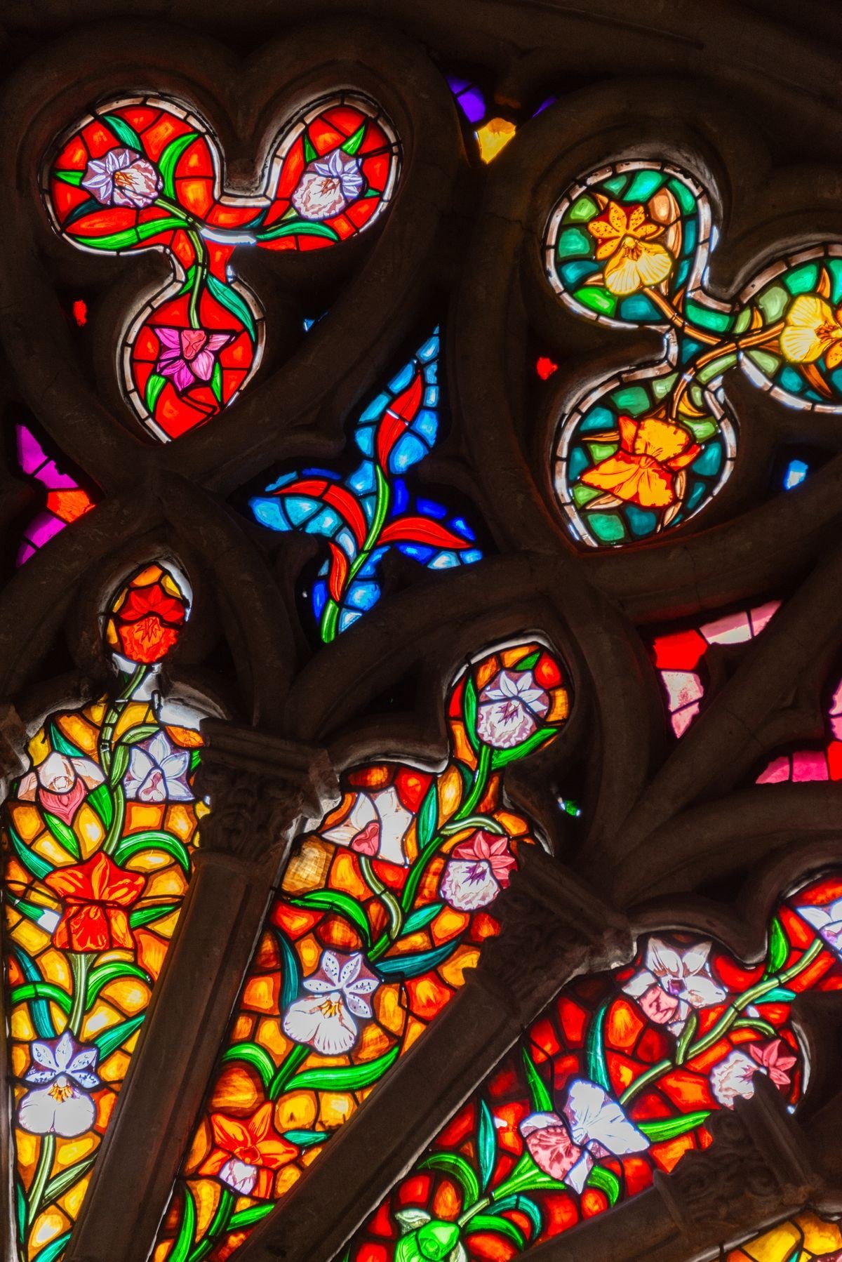Elegant stained glass wedding arch setup with budget-friendly decor