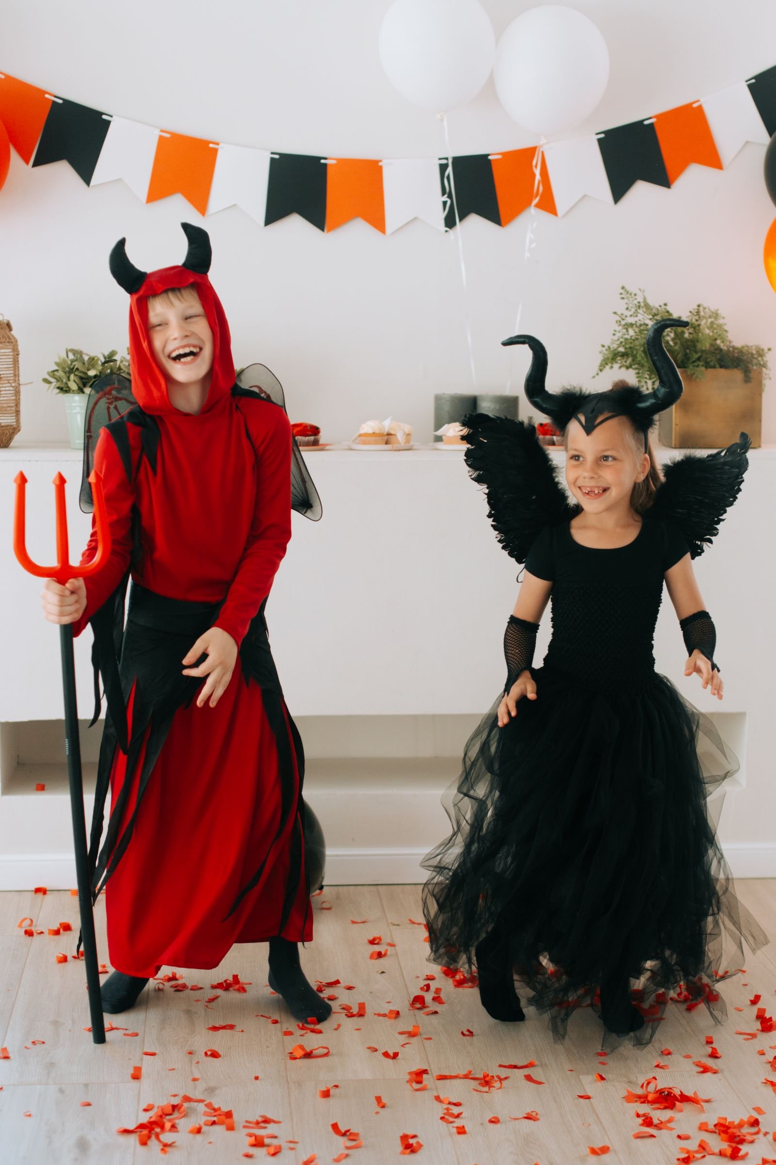 Vintage Halloween costume displayed on a dress form with accessories