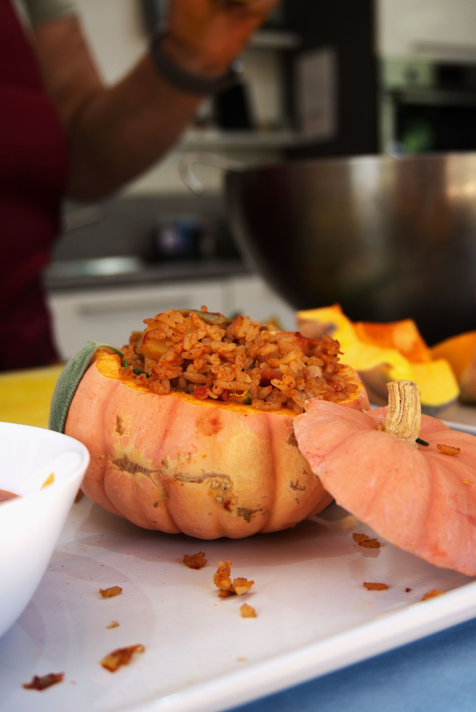 Serving a scoop of golden cornbread stuffing