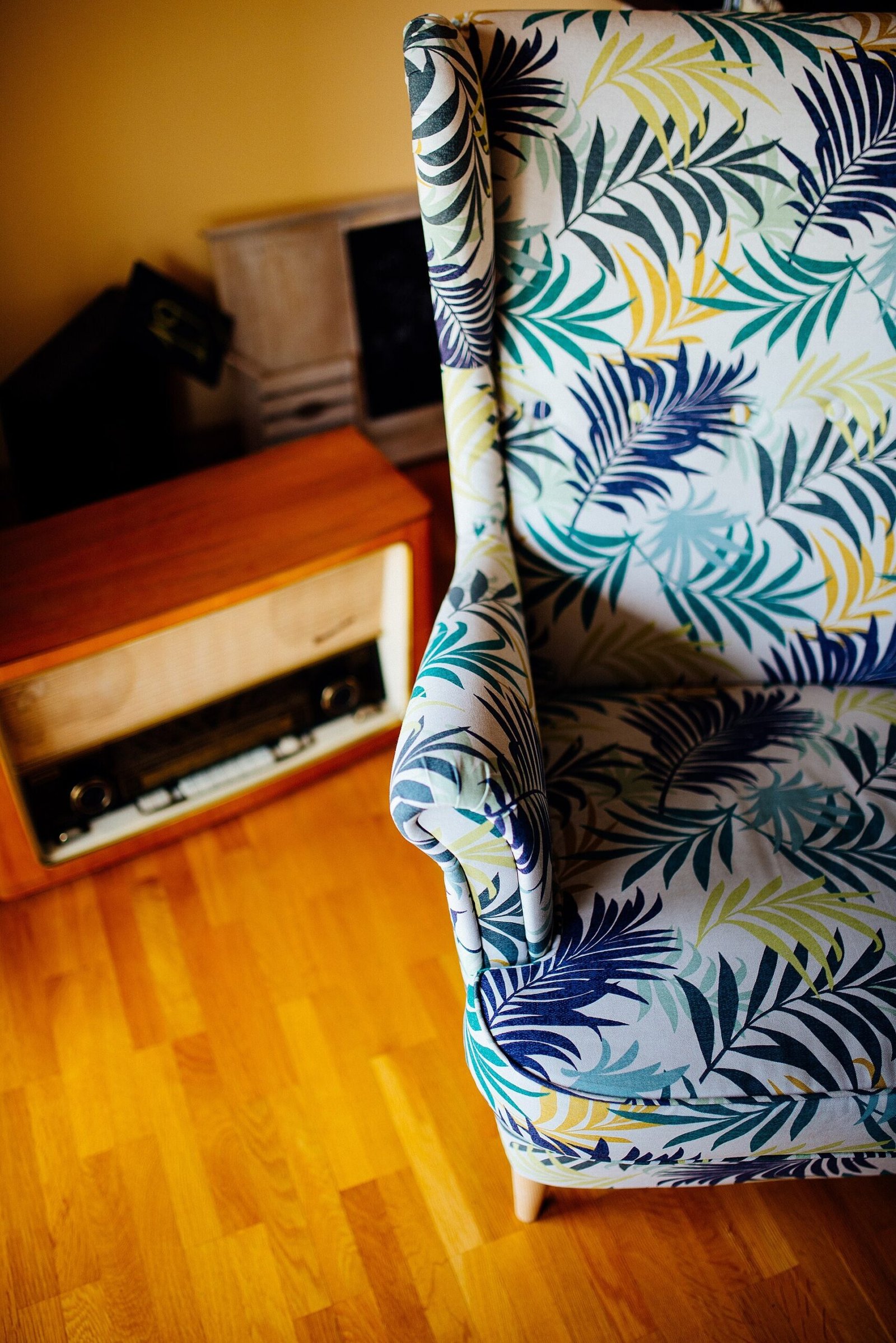 Floral chintz armchair with autumn rose pattern in a grandmacore living room