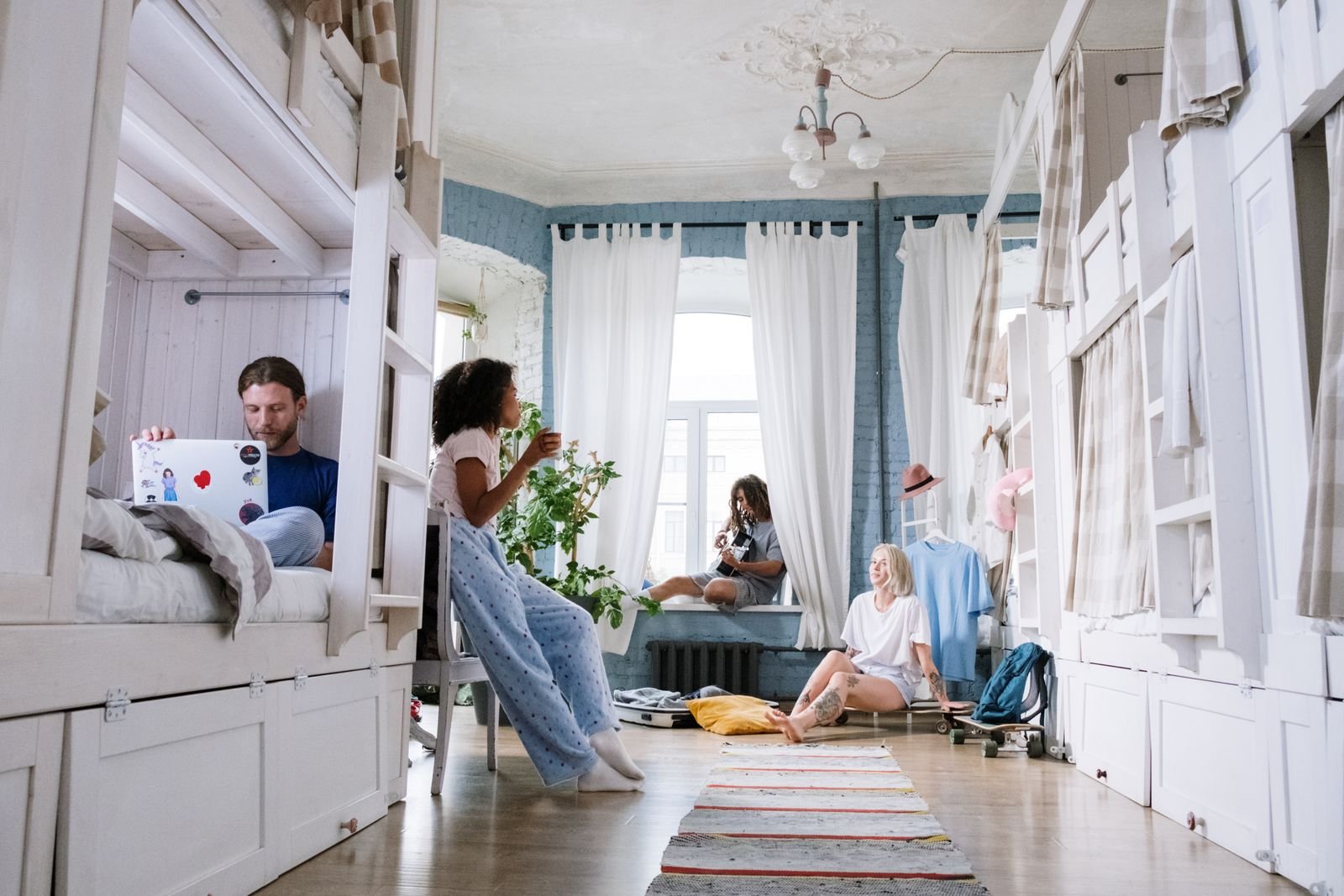 Dorm room styled with festoon lights and circus-inspired decor