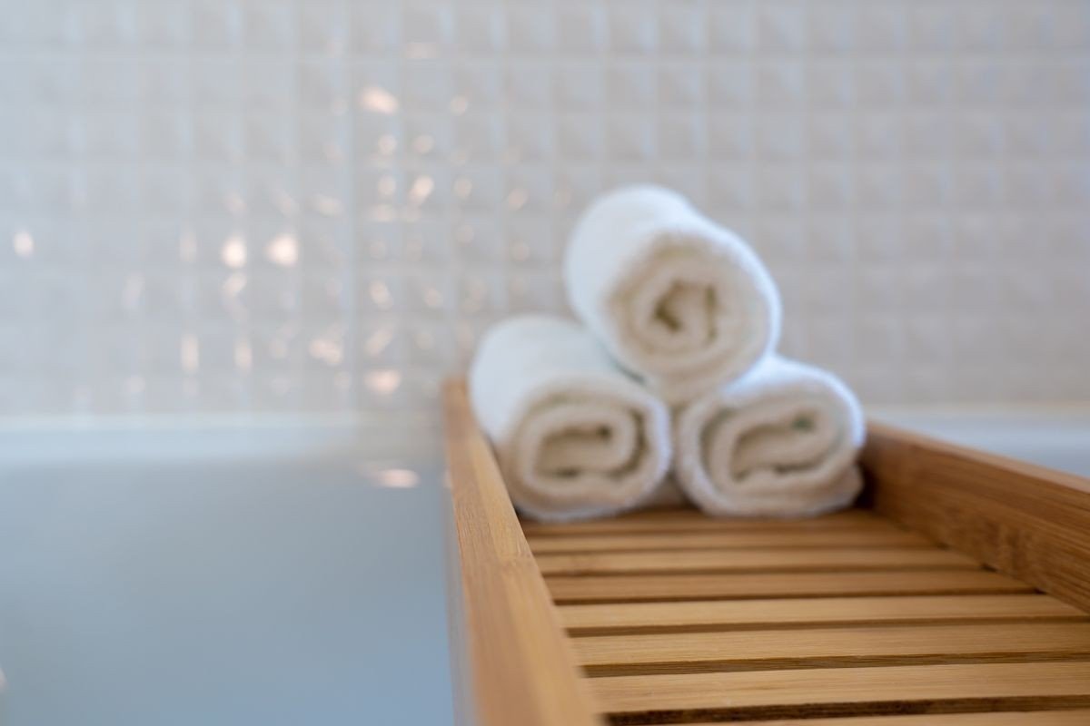 Summer body care with light lotion and a refreshing cool shower