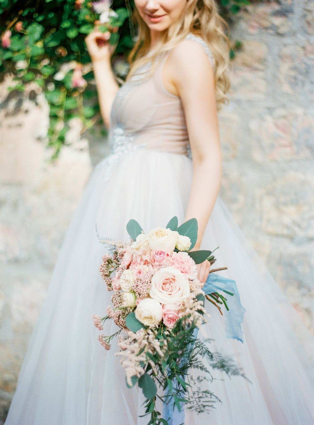 Outdoor wedding ceremony with floral arch at Monet themed garden wedding
