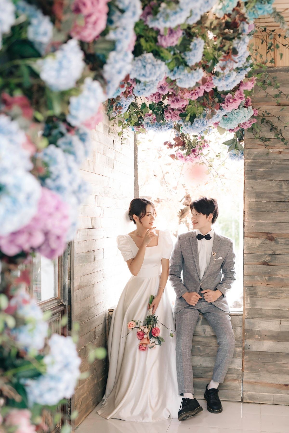 Wedding send-off with flower petals at Monet inspired celebration