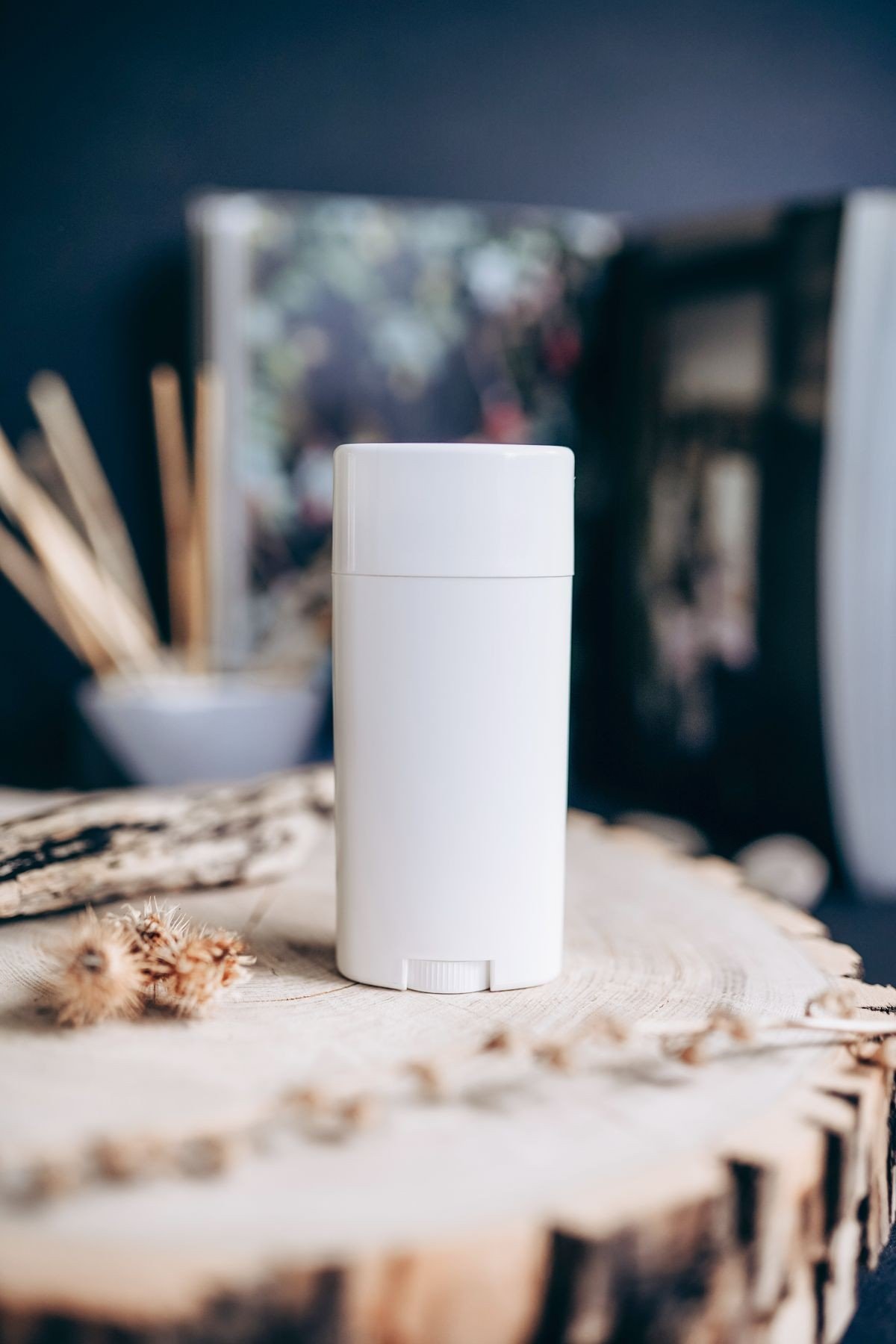 Applying retinol body lotion to arms in the evening routine