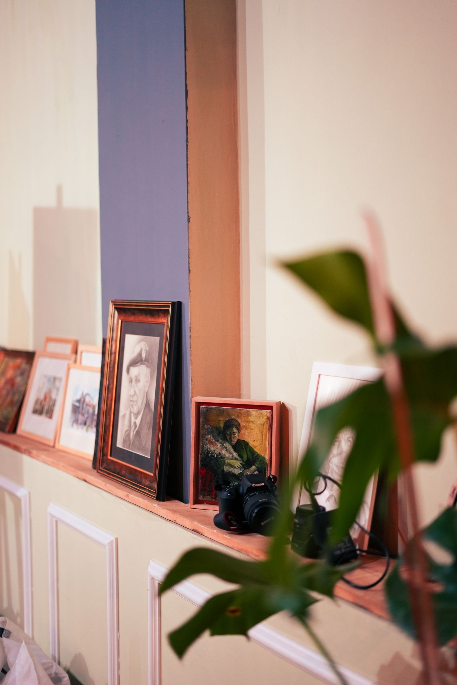 Printed family photographs sorted for a gallery wall