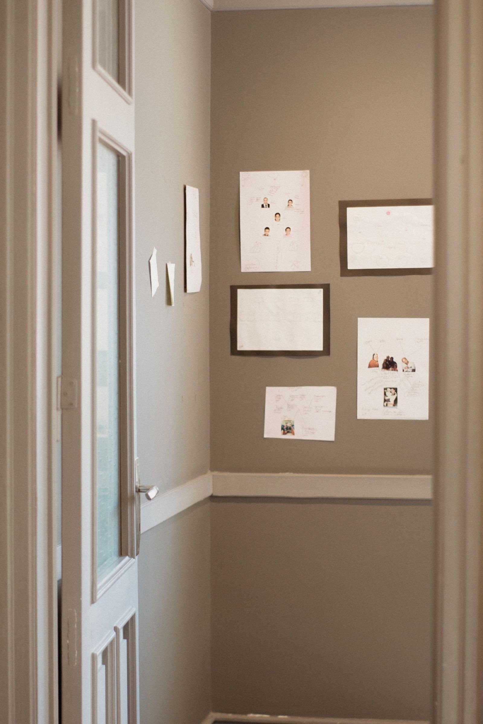 Picture ledges displaying layered family photos