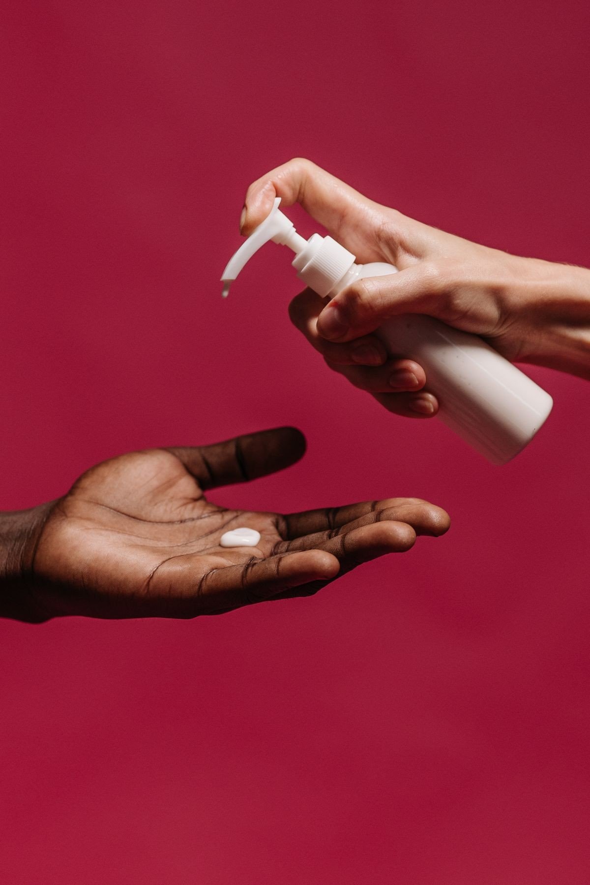 Simple body care shelf with retinol lotion, cleanser, and sunscreen