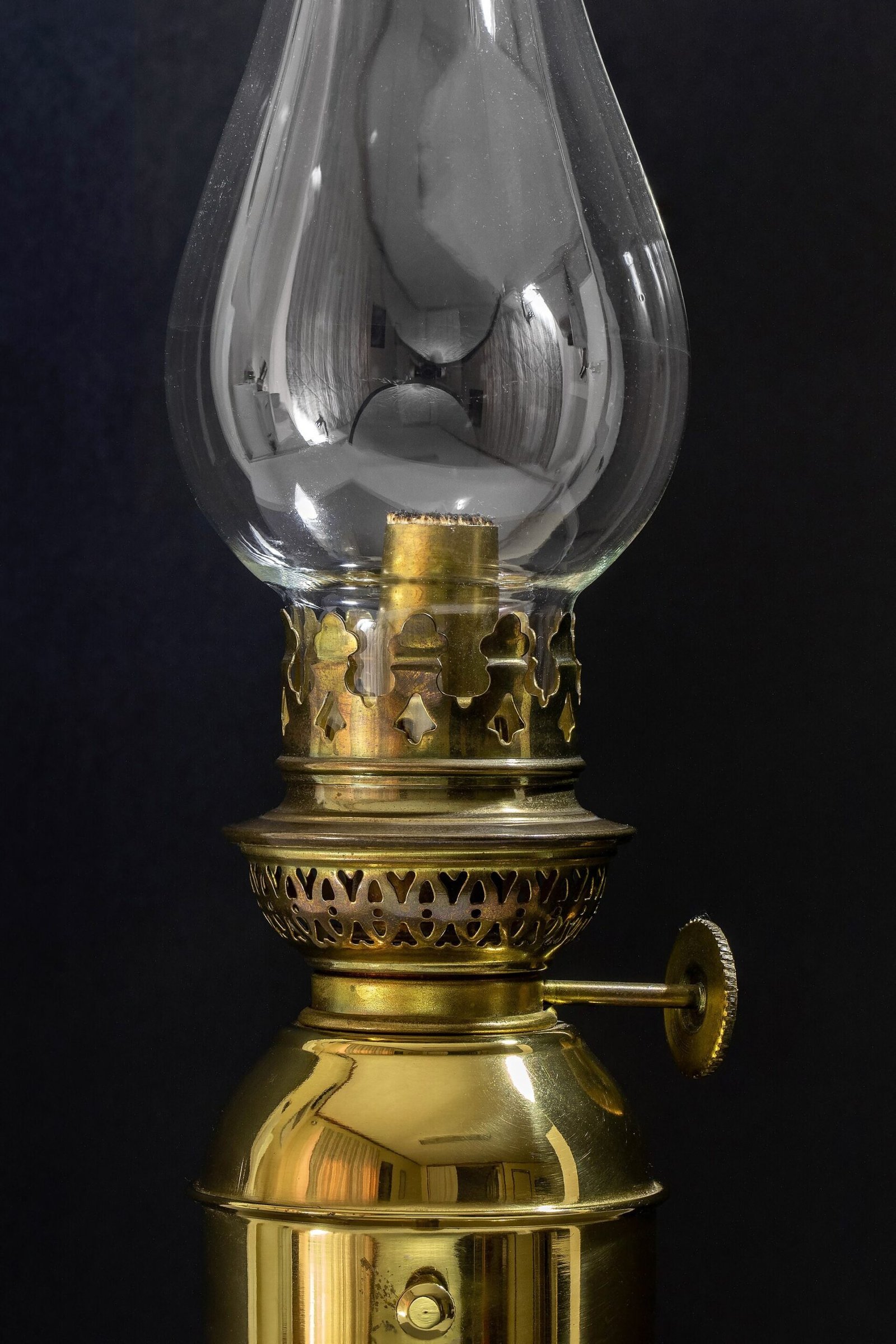 Hands polishing a brass candlestick showing simple care for brass decor