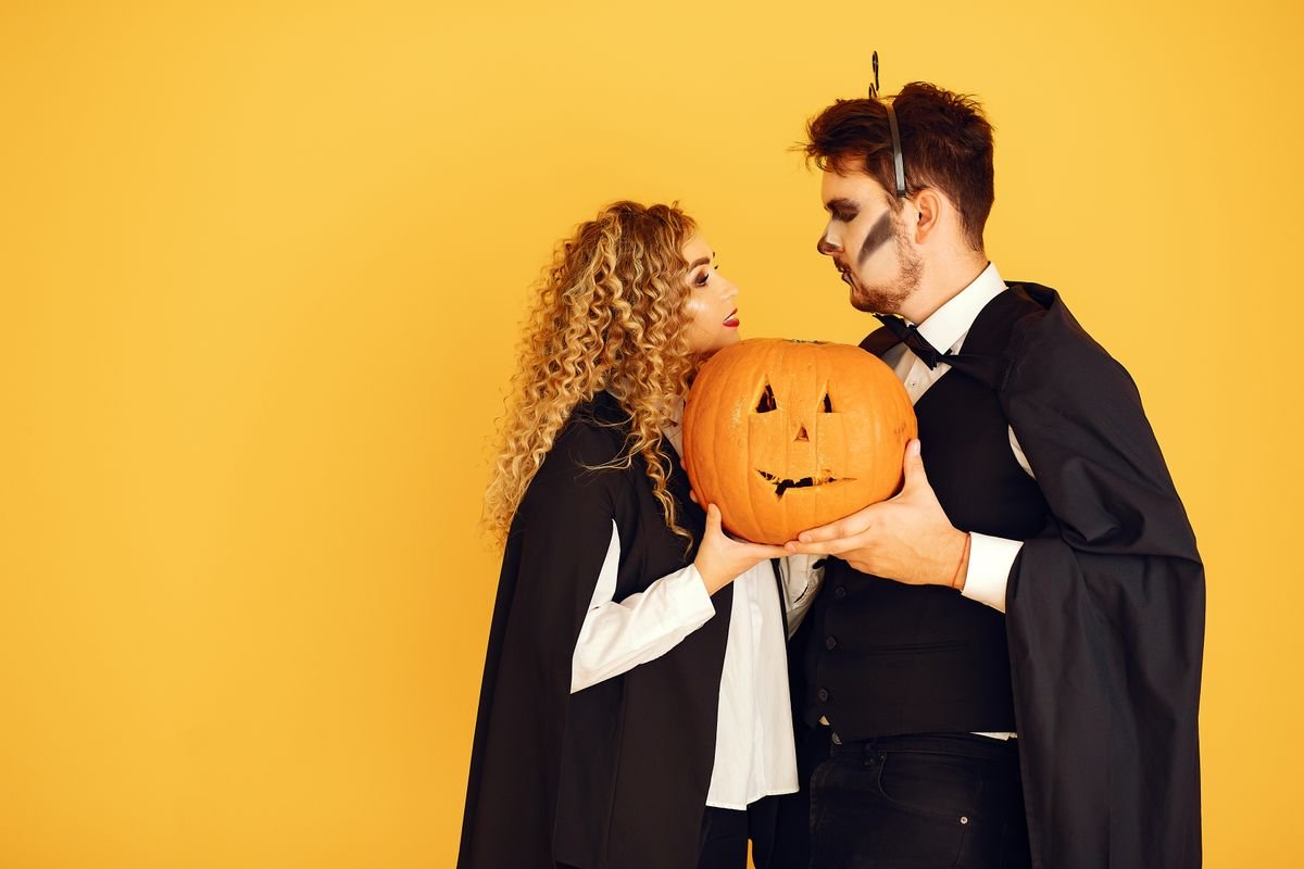Coordinated blue red and gold colour palette for a couples costume