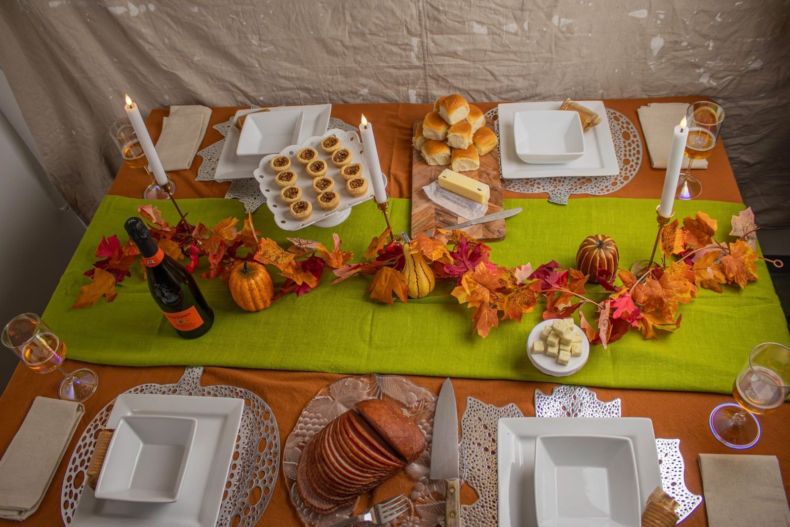 Formal elegant Thanksgiving table with gold chargers and crystal