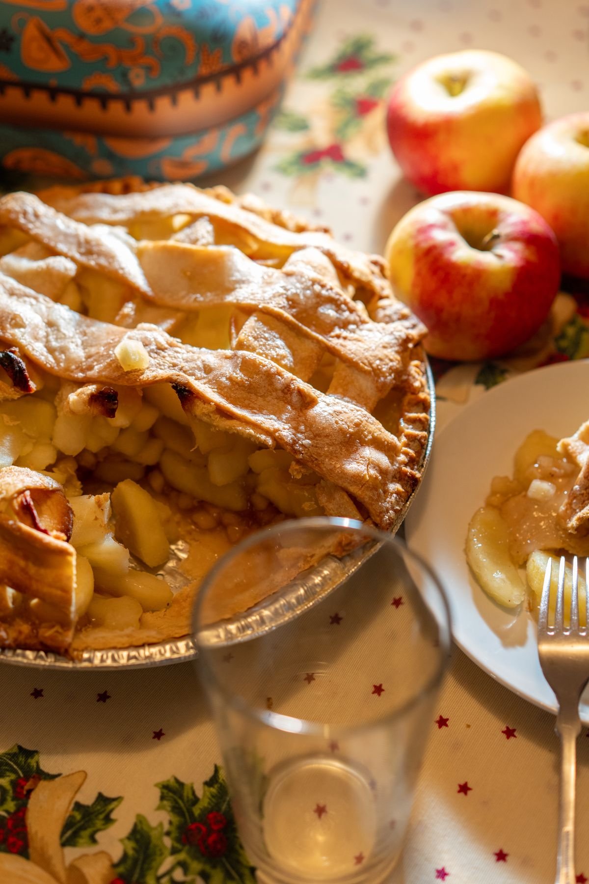 Serving warm apple pie biscuits with butter and a cup of coffee
