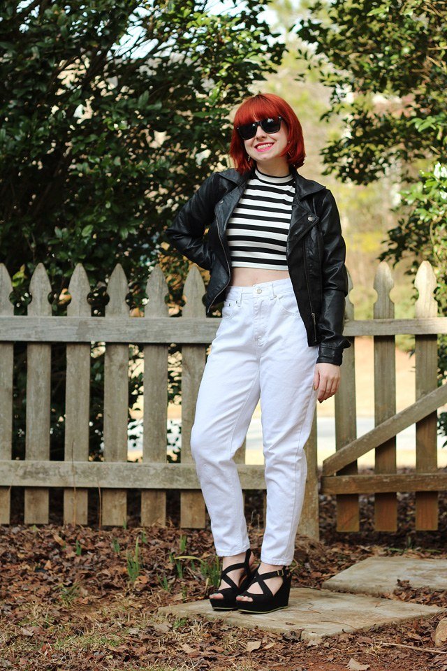 Cropped black leather jacket with barrel leg jeans for edgy fall style