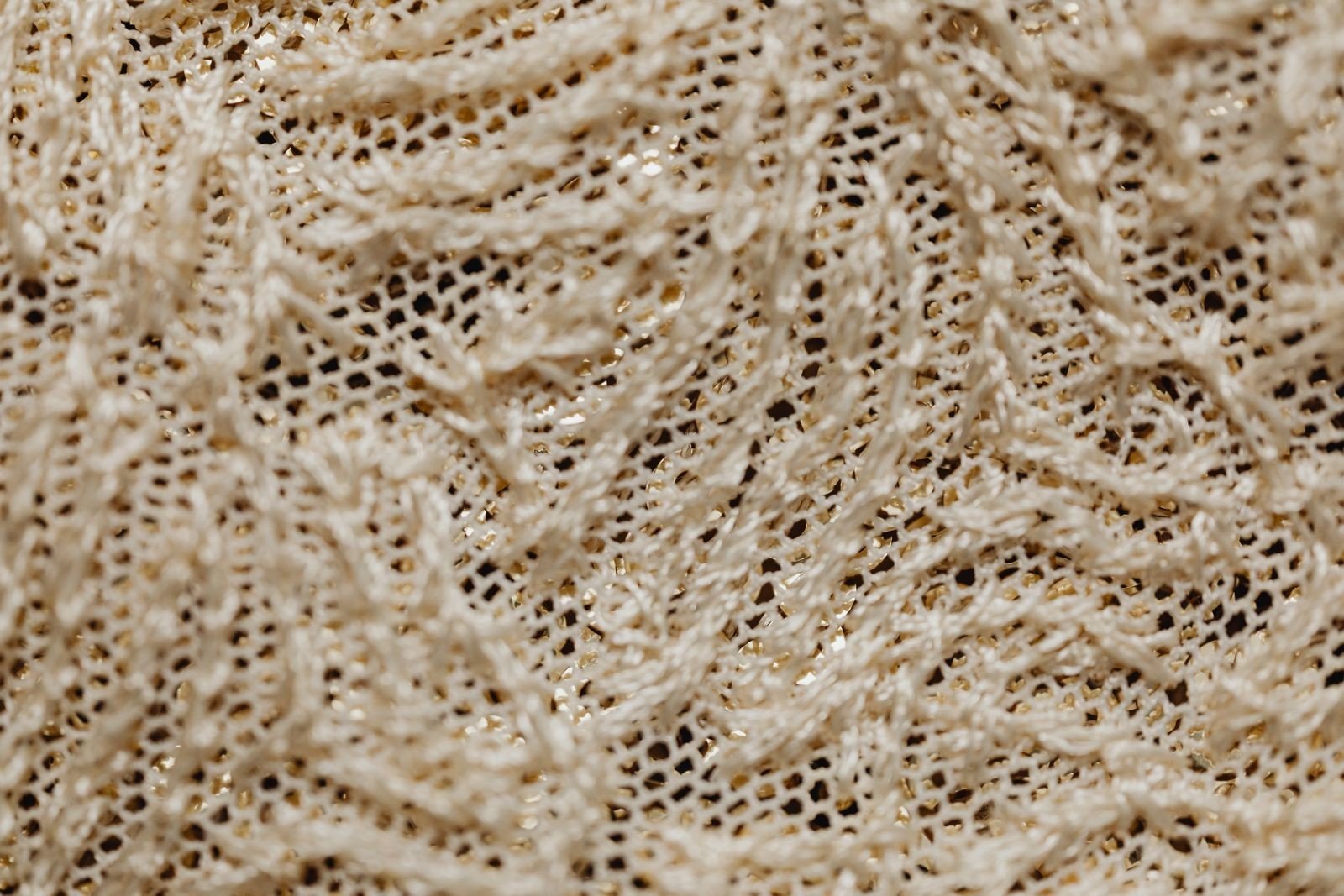 Applying lace nail stickers onto a polished nail